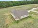 Aerial view of a house with a large backyard at 615 Henderson Mill Rd, Covington, GA 30014
