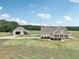 House and detached barn on large lot with open fields at 615 Henderson Mill Rd, Covington, GA 30014