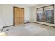 Empty bedroom with carpeted floors and window at 1875 Abbie Ln, Jonesboro, GA 30236