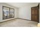 Empty bedroom with carpeted floors and window at 1875 Abbie Ln, Jonesboro, GA 30236