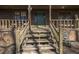 Wooden front porch with steps leading to front door at 1875 Abbie Ln, Jonesboro, GA 30236