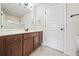 Simple bathroom with a vanity, toilet, and tiled floor at 603 Amanda Leigh Ct, Loganville, GA 30052