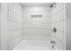 Nicely renovated tub and shower combo featuring subway tile at 6851 Roswell Rd # N-20, Sandy Springs, GA 30328