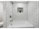 Bathroom featuring a tiled shower, white subway tiles, and modern fixtures at 6851 Roswell Rd # N-20, Sandy Springs, GA 30328