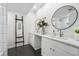 This bathroom offers double sinks, granite countertops and stylish mirrors at 6851 Roswell Rd # N-20, Sandy Springs, GA 30328