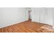 Bedroom showcasing hardwood floors and a spacious closet at 6851 Roswell Rd # N-20, Sandy Springs, GA 30328