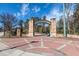 A brick-paved entrance adorned with stone pillars welcomes you to the Abernathy Greenway at 6851 Roswell Rd # N-20, Sandy Springs, GA 30328