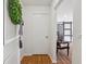 Condo entry with wood floors, white walls, and a glimpse of the living area at 6851 Roswell Rd # N-20, Sandy Springs, GA 30328