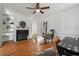 Bright living room boasts hardwood floors, fireplace, and detailed trim at 6851 Roswell Rd # N-20, Sandy Springs, GA 30328