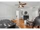 The well-lit living room showcases hardwood floors, fireplace and detailed trim at 6851 Roswell Rd # N-20, Sandy Springs, GA 30328