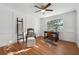 Sun-lit living room featuring hardwood floors, detailed trim, and large window at 6851 Roswell Rd # N-20, Sandy Springs, GA 30328