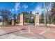 Entrance to a park with brick pathway at 6851 Roswell Rd # N-20, Sandy Springs, GA 30328