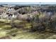 Aerial view showcasing a house nestled in a wooded area, offering privacy and natural beauty at 9776 Spyglass Dr, Villa Rica, GA 30180