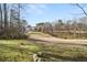 Backyard view of the property and surrounding landscape at 9776 Spyglass Dr, Villa Rica, GA 30180