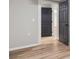 Spacious finished basement bedroom with light grey walls and dark grey doors at 9776 Spyglass Dr, Villa Rica, GA 30180