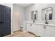 Basement bathroom with double vanity and walk-in shower at 9776 Spyglass Dr, Villa Rica, GA 30180