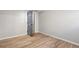 Spacious basement bedroom with light grey walls and vinyl flooring at 9776 Spyglass Dr, Villa Rica, GA 30180