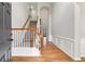 Bright and spacious entryway with hardwood floors and staircase at 9776 Spyglass Dr, Villa Rica, GA 30180