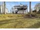 House exterior showcasing a deck, stairs, and backyard view at 9776 Spyglass Dr, Villa Rica, GA 30180