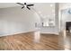 Open living room with hardwood floors, high ceilings and kitchen views at 9776 Spyglass Dr, Villa Rica, GA 30180