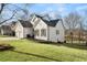 Home exterior showcasing a well-manicured lawn and classic architectural details at 9776 Spyglass Dr, Villa Rica, GA 30180