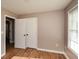 Bedroom with double door closet and window at 202 Greentree Trl, Temple, GA 30179