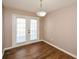 Dining room with hardwood floors and French doors leading to the outdoors at 202 Greentree Trl, Temple, GA 30179