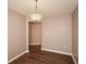 Simple dining room with hardwood floors and an open layout at 202 Greentree Trl, Temple, GA 30179