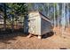 Wooden storage shed in backyard at 202 Greentree Trl, Temple, GA 30179