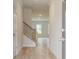 Bright entryway with light hardwood floors and staircase at 70 Barge Ln, Covington, GA 30016