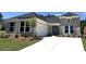 Charming single-story home featuring a mix of brick and siding, complemented by a well-manicured lawn and an attached garage at 15 Cambridge Ln, Dallas, GA 30157