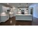 Modern kitchen with white cabinets, stainless steel appliances, and a spacious center island at 15 Cambridge Ln, Dallas, GA 30157
