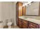 Bathroom boasts a vanity with a framed mirror at 901 Abernathy Ne Rd # 5050, Atlanta, GA 30328