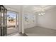 Bright dining room with hardwood floors and view of front porch at 13532 Whitman Ln, Covington, GA 30014