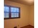 Simple bedroom with neutral walls and a window at 4890 Prince Se Rd, Smyrna, GA 30082