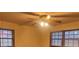 Bright bedroom with ceiling fan and large windows at 4890 Prince Se Rd, Smyrna, GA 30082