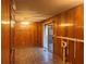 Dining area with wood paneling and access to deck at 4890 Prince Se Rd, Smyrna, GA 30082