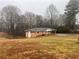 Ranch house view from a distance at 4890 Prince Se Rd, Smyrna, GA 30082