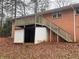 Back of house, deck, and storage unit at 4890 Prince Se Rd, Smyrna, GA 30082