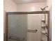 Walk-in shower with tiled walls at 4890 Prince Se Rd, Smyrna, GA 30082