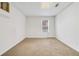 Empty basement room with carpeted floor and single window at 2155 Washington Dr, Douglasville, GA 30135