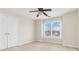 Bedroom featuring a ceiling fan and large window at 2155 Washington Dr, Douglasville, GA 30135