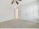 Bedroom with double door closet and ceiling fan at 2155 Washington Dr, Douglasville, GA 30135