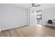 Spacious bedroom with hardwood floors and access to balcony at 620 Peachtree Ne St # 1406, Atlanta, GA 30308