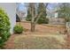 Landscaped backyard with stone retaining wall and steps at , Brookhaven, GA 30319