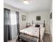 Cozy bedroom with a double bed and gray curtains at 219 Valerie Cir, Hiram, GA 30141