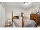 Cozy bedroom with a wood post bed and plenty of closet space at 219 Valerie Cir, Hiram, GA 30141