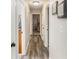 Bright hallway with gray wood-look flooring at 219 Valerie Cir, Hiram, GA 30141