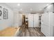 Updated kitchen featuring gray cabinets and wood flooring at 219 Valerie Cir, Hiram, GA 30141