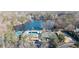 Aerial view of community amenities including lake at 3173 Woodrow Ne Way, Brookhaven, GA 30319